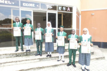 Students of Key Special Academy, Gwarinpa,Abuja displays copies of Teen Trust